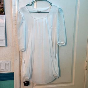 White flowy blouse. Woman’s small.